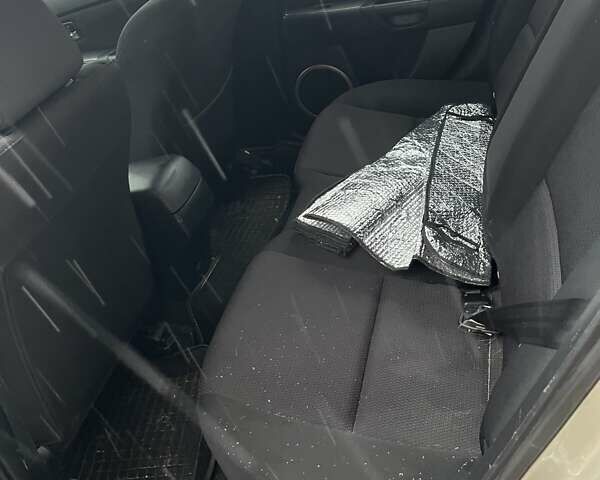 Бежевий Мазда 3, об'ємом двигуна 2 л та пробігом 275 тис. км за 7000 $, фото 3 на Automoto.ua