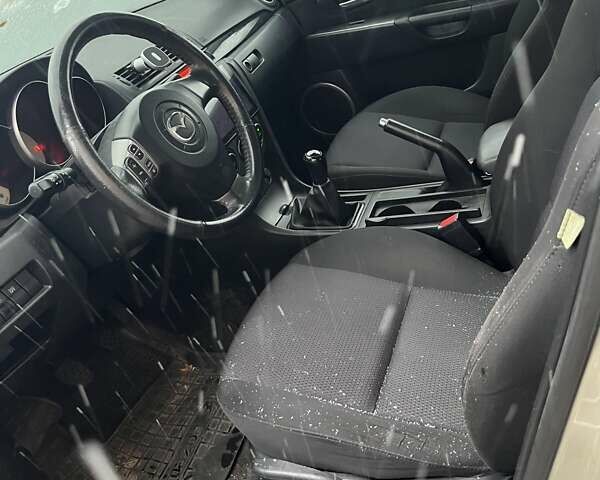 Бежевий Мазда 3, об'ємом двигуна 2 л та пробігом 275 тис. км за 7000 $, фото 4 на Automoto.ua