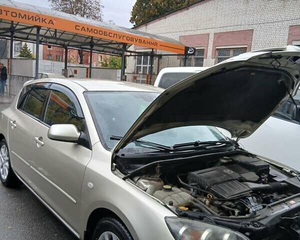 Бежевый Мазда 3, объемом двигателя 1.6 л и пробегом 143 тыс. км за 6200 $, фото 10 на Automoto.ua