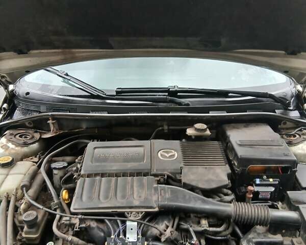 Бежевый Мазда 3, объемом двигателя 1.6 л и пробегом 143 тыс. км за 6200 $, фото 12 на Automoto.ua