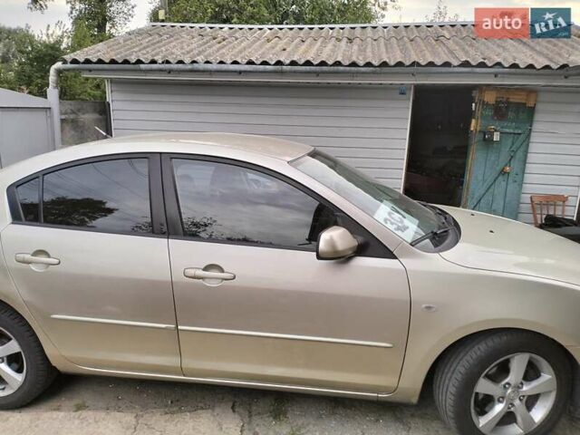 Бежевий Мазда 3, об'ємом двигуна 1.6 л та пробігом 230 тис. км за 3500 $, фото 1 на Automoto.ua