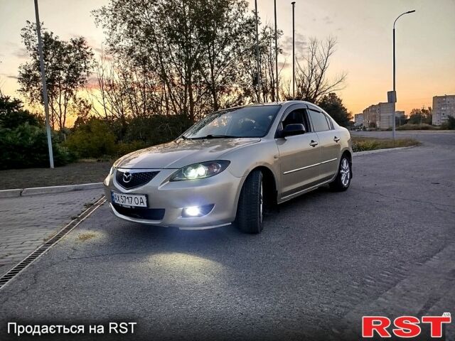 Бежевый Мазда 3, объемом двигателя 1.6 л и пробегом 240 тыс. км за 4300 $, фото 2 на Automoto.ua