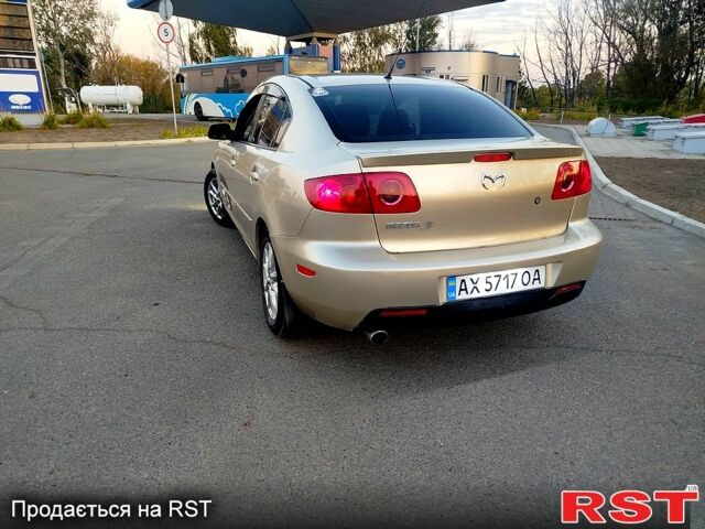 Бежевый Мазда 3, объемом двигателя 1.6 л и пробегом 240 тыс. км за 4300 $, фото 1 на Automoto.ua