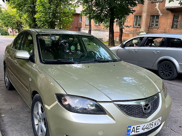 Бежевый Мазда 3, объемом двигателя 2 л и пробегом 270 тыс. км за 4100 $, фото 4 на Automoto.ua