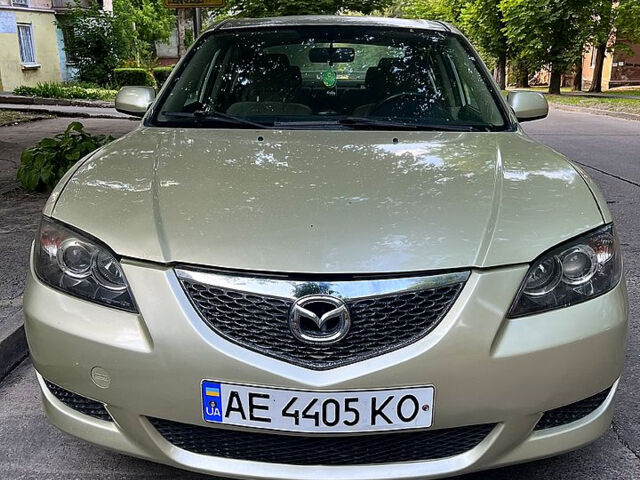Бежевый Мазда 3, объемом двигателя 2 л и пробегом 270 тыс. км за 4100 $, фото 2 на Automoto.ua