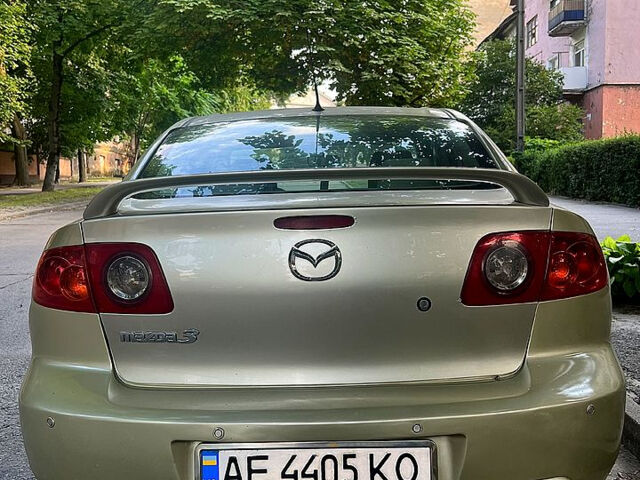 Бежевый Мазда 3, объемом двигателя 2 л и пробегом 270 тыс. км за 4100 $, фото 3 на Automoto.ua