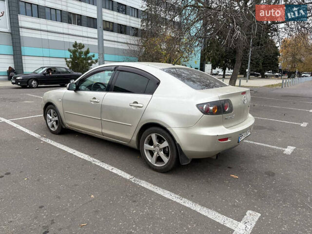 Бежевый Мазда 3, объемом двигателя 1.6 л и пробегом 230 тыс. км за 4000 $, фото 2 на Automoto.ua