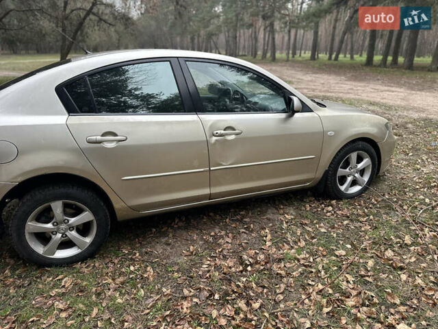 Бежевий Мазда 3, об'ємом двигуна 1.6 л та пробігом 252 тис. км за 4000 $, фото 3 на Automoto.ua