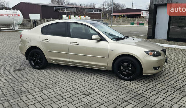 Бежевый Мазда 3, объемом двигателя 1.6 л и пробегом 236 тыс. км за 4900 $, фото 5 на Automoto.ua