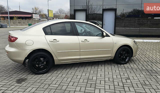 Бежевый Мазда 3, объемом двигателя 1.6 л и пробегом 236 тыс. км за 4900 $, фото 6 на Automoto.ua