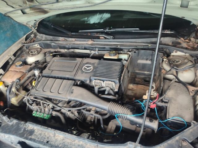 Бежевий Мазда 3, об'ємом двигуна 1.6 л та пробігом 360 тис. км за 1550 $, фото 1 на Automoto.ua