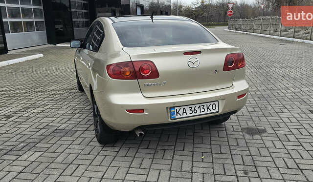 Бежевый Мазда 3, объемом двигателя 1.6 л и пробегом 236 тыс. км за 4900 $, фото 9 на Automoto.ua
