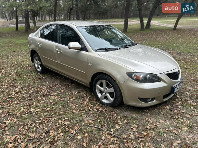 Бежевий Мазда 3, об'ємом двигуна 1.6 л та пробігом 252 тис. км за 4000 $, фото 4 на Automoto.ua