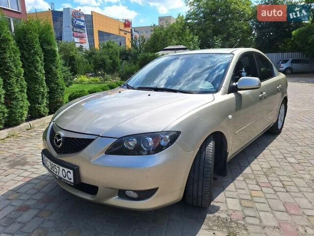 Бежевий Мазда 3, об'ємом двигуна 1.6 л та пробігом 247 тис. км за 5300 $, фото 3 на Automoto.ua