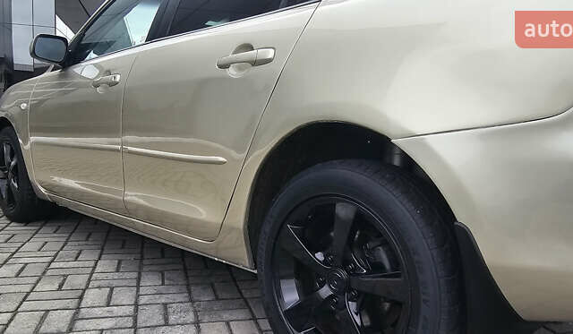 Бежевый Мазда 3, объемом двигателя 1.6 л и пробегом 236 тыс. км за 4900 $, фото 13 на Automoto.ua