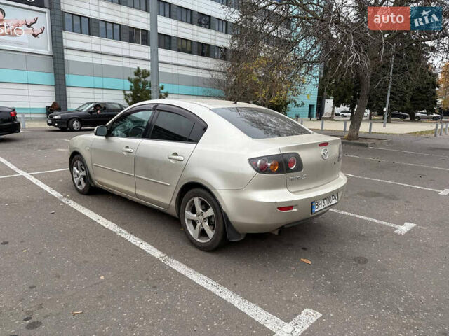 Бежевый Мазда 3, объемом двигателя 1.6 л и пробегом 230 тыс. км за 4000 $, фото 1 на Automoto.ua