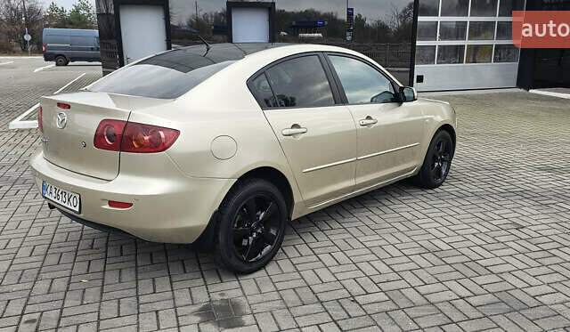 Бежевый Мазда 3, объемом двигателя 1.6 л и пробегом 236 тыс. км за 4900 $, фото 7 на Automoto.ua