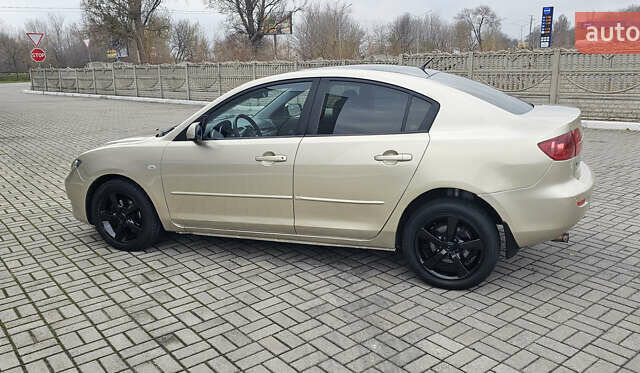 Бежевый Мазда 3, объемом двигателя 1.6 л и пробегом 236 тыс. км за 4900 $, фото 11 на Automoto.ua