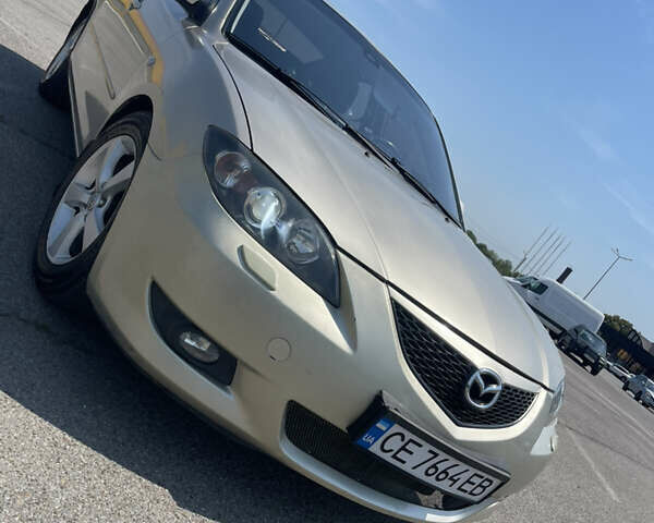 Бежевый Мазда 3, объемом двигателя 1.6 л и пробегом 217 тыс. км за 3200 $, фото 1 на Automoto.ua