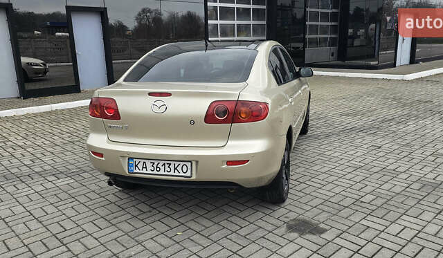 Бежевый Мазда 3, объемом двигателя 1.6 л и пробегом 236 тыс. км за 4900 $, фото 8 на Automoto.ua