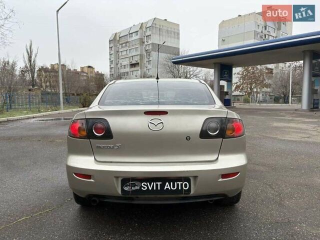 Бежевый Мазда 3, объемом двигателя 1.6 л и пробегом 265 тыс. км за 4999 $, фото 12 на Automoto.ua