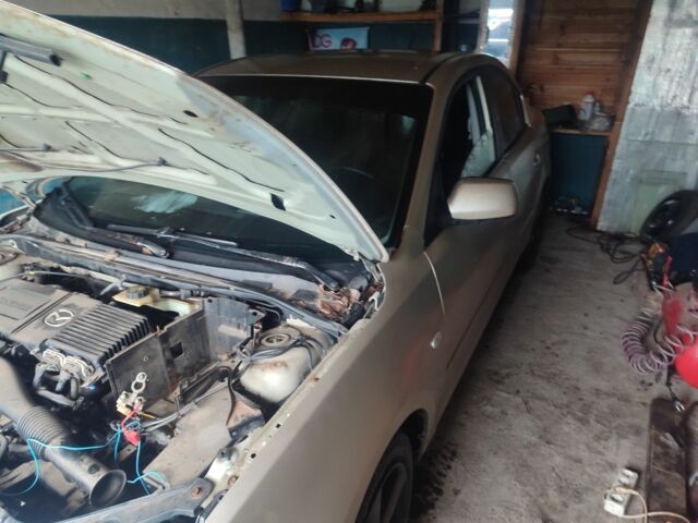 Бежевий Мазда 3, об'ємом двигуна 1.6 л та пробігом 360 тис. км за 1550 $, фото 4 на Automoto.ua