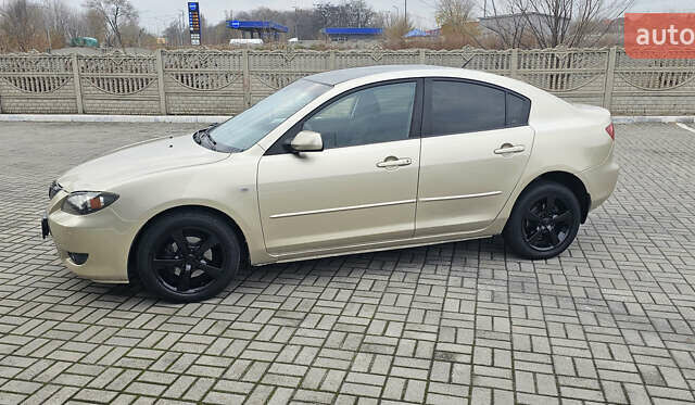 Бежевый Мазда 3, объемом двигателя 1.6 л и пробегом 236 тыс. км за 4900 $, фото 12 на Automoto.ua