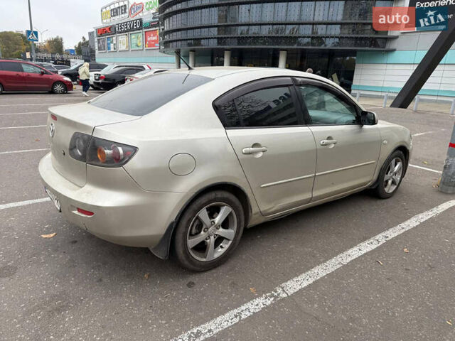 Бежевый Мазда 3, объемом двигателя 1.6 л и пробегом 230 тыс. км за 4000 $, фото 3 на Automoto.ua