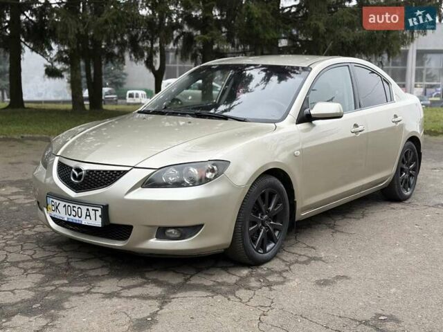Бежевый Мазда 3, объемом двигателя 1.6 л и пробегом 220 тыс. км за 3499 $, фото 2 на Automoto.ua