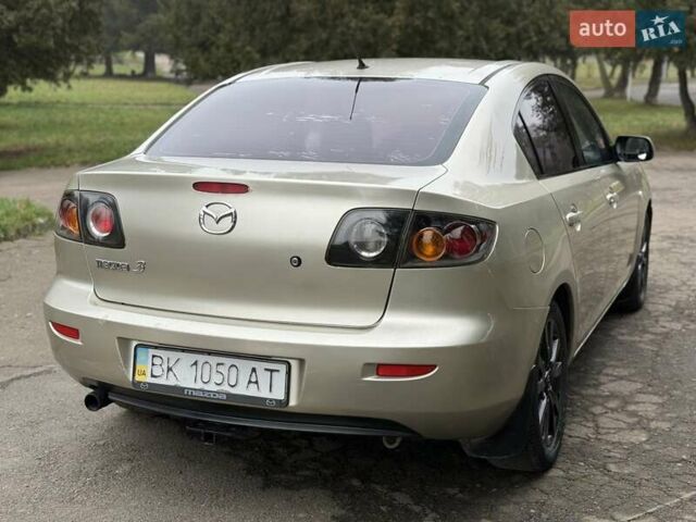 Бежевый Мазда 3, объемом двигателя 1.6 л и пробегом 220 тыс. км за 3499 $, фото 23 на Automoto.ua