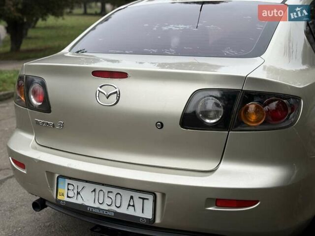 Бежевый Мазда 3, объемом двигателя 1.6 л и пробегом 220 тыс. км за 3499 $, фото 24 на Automoto.ua