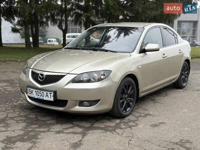 Бежевый Мазда 3, объемом двигателя 1.6 л и пробегом 220 тыс. км за 3499 $, фото 1 на Automoto.ua