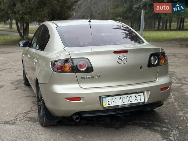 Бежевый Мазда 3, объемом двигателя 1.6 л и пробегом 220 тыс. км за 3499 $, фото 26 на Automoto.ua