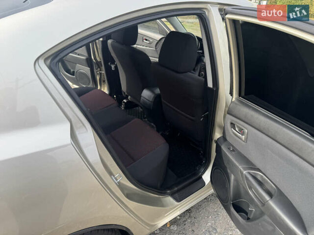 Мазда 3 2006 у Полтаві на Automoto.ua Бежевий Мазда 3, об'ємом двигуна 1.6 л та пробігом 193 тис. км за 6500 $, фото 38 на Automoto.ua