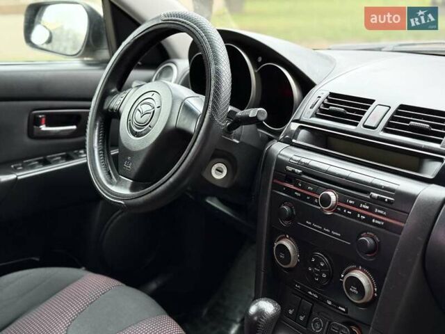 Бежевый Мазда 3, объемом двигателя 1.6 л и пробегом 220 тыс. км за 3499 $, фото 36 на Automoto.ua