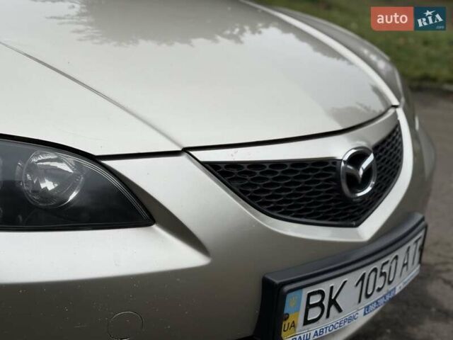 Бежевый Мазда 3, объемом двигателя 1.6 л и пробегом 220 тыс. км за 3499 $, фото 17 на Automoto.ua