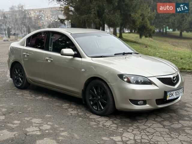 Бежевый Мазда 3, объемом двигателя 1.6 л и пробегом 220 тыс. км за 3499 $, фото 14 на Automoto.ua