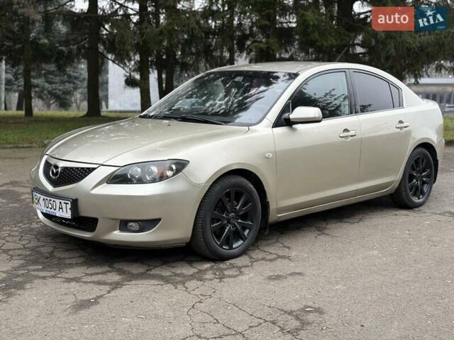 Бежевый Мазда 3, объемом двигателя 1.6 л и пробегом 220 тыс. км за 3499 $, фото 4 на Automoto.ua