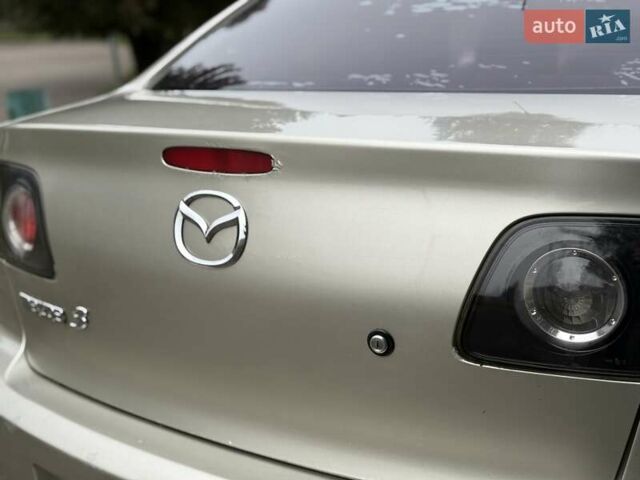Бежевый Мазда 3, объемом двигателя 1.6 л и пробегом 220 тыс. км за 3499 $, фото 25 на Automoto.ua