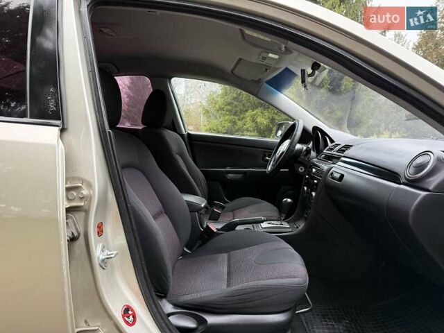 Бежевый Мазда 3, объемом двигателя 1.6 л и пробегом 220 тыс. км за 3499 $, фото 31 на Automoto.ua