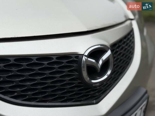 Бежевый Мазда 3, объемом двигателя 1.6 л и пробегом 220 тыс. км за 3499 $, фото 18 на Automoto.ua