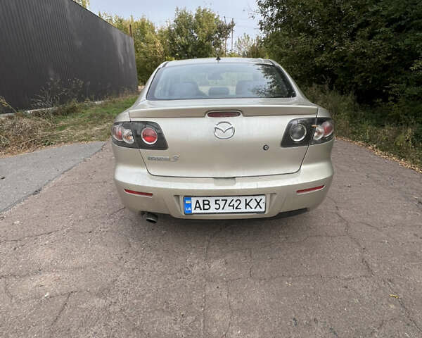 Бежевый Мазда 3, объемом двигателя 1.6 л и пробегом 249 тыс. км за 4300 $, фото 7 на Automoto.ua