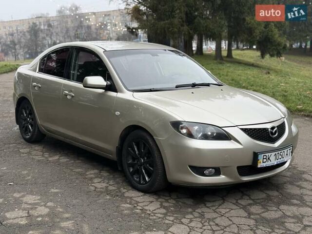 Бежевый Мазда 3, объемом двигателя 1.6 л и пробегом 220 тыс. км за 3499 $, фото 12 на Automoto.ua