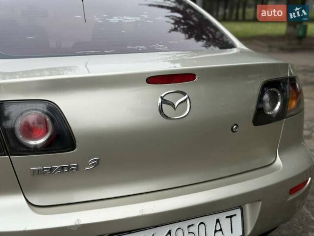 Бежевый Мазда 3, объемом двигателя 1.6 л и пробегом 220 тыс. км за 3499 $, фото 29 на Automoto.ua