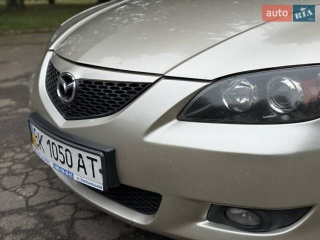 Бежевый Мазда 3, объемом двигателя 1.6 л и пробегом 220 тыс. км за 3499 $, фото 7 на Automoto.ua