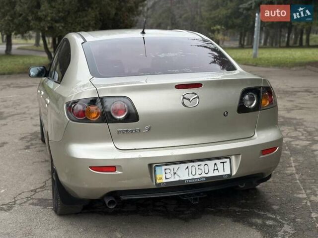 Бежевый Мазда 3, объемом двигателя 1.6 л и пробегом 220 тыс. км за 3499 $, фото 27 на Automoto.ua