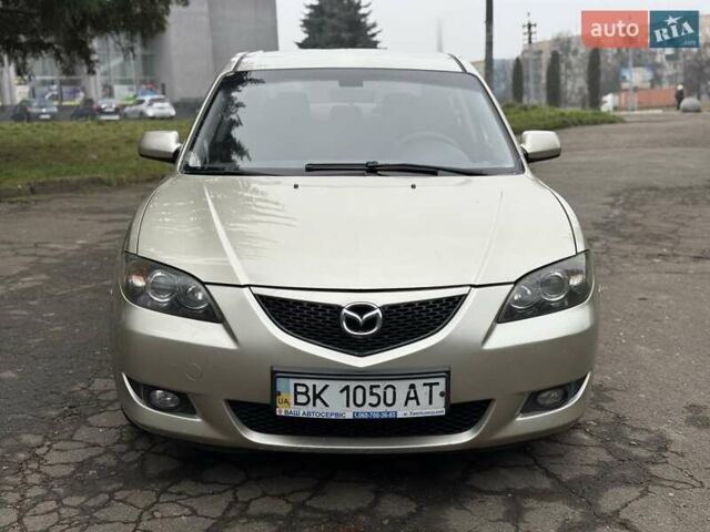 Бежевый Мазда 3, объемом двигателя 1.6 л и пробегом 220 тыс. км за 3499 $, фото 10 на Automoto.ua