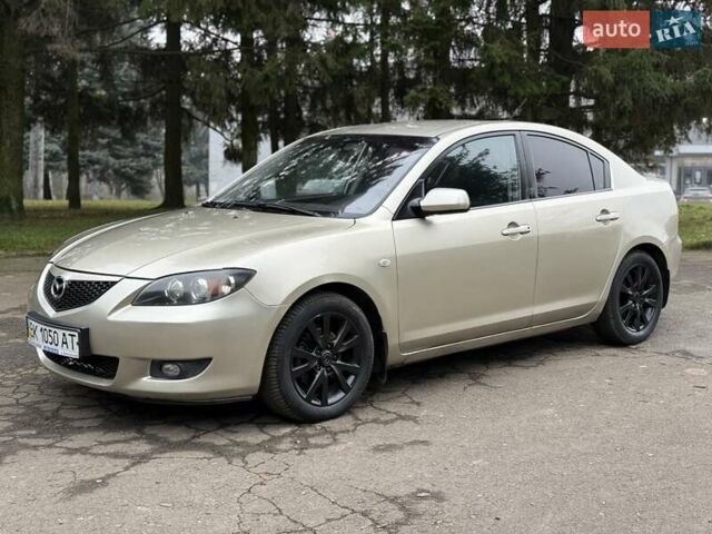 Бежевый Мазда 3, объемом двигателя 1.6 л и пробегом 220 тыс. км за 3499 $, фото 5 на Automoto.ua