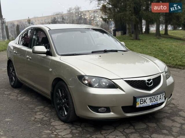 Бежевый Мазда 3, объемом двигателя 1.6 л и пробегом 220 тыс. км за 3499 $, фото 11 на Automoto.ua