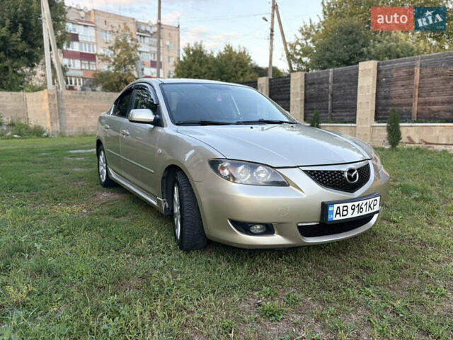 Бежевий Мазда 3, об'ємом двигуна 1.6 л та пробігом 299 тис. км за 5450 $, фото 3 на Automoto.ua